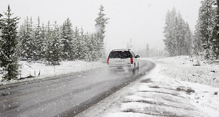 car snowy road