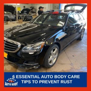 A shiny black Mercedes Benz car parked inside Barry's Auto Body Garage, showcasing a rust-free, well-maintained exterior