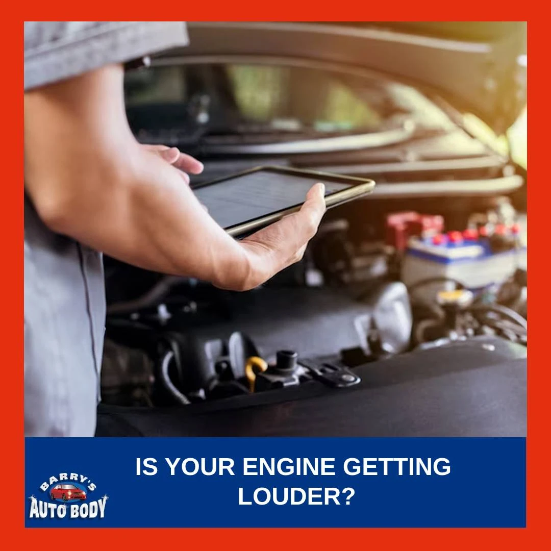 Driver concerned about louder engine noises inspecting under car hood.