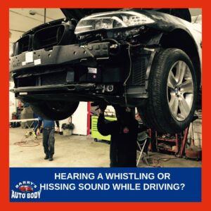 Driver inspecting engine bay due to unusual whistling or hissing sound.